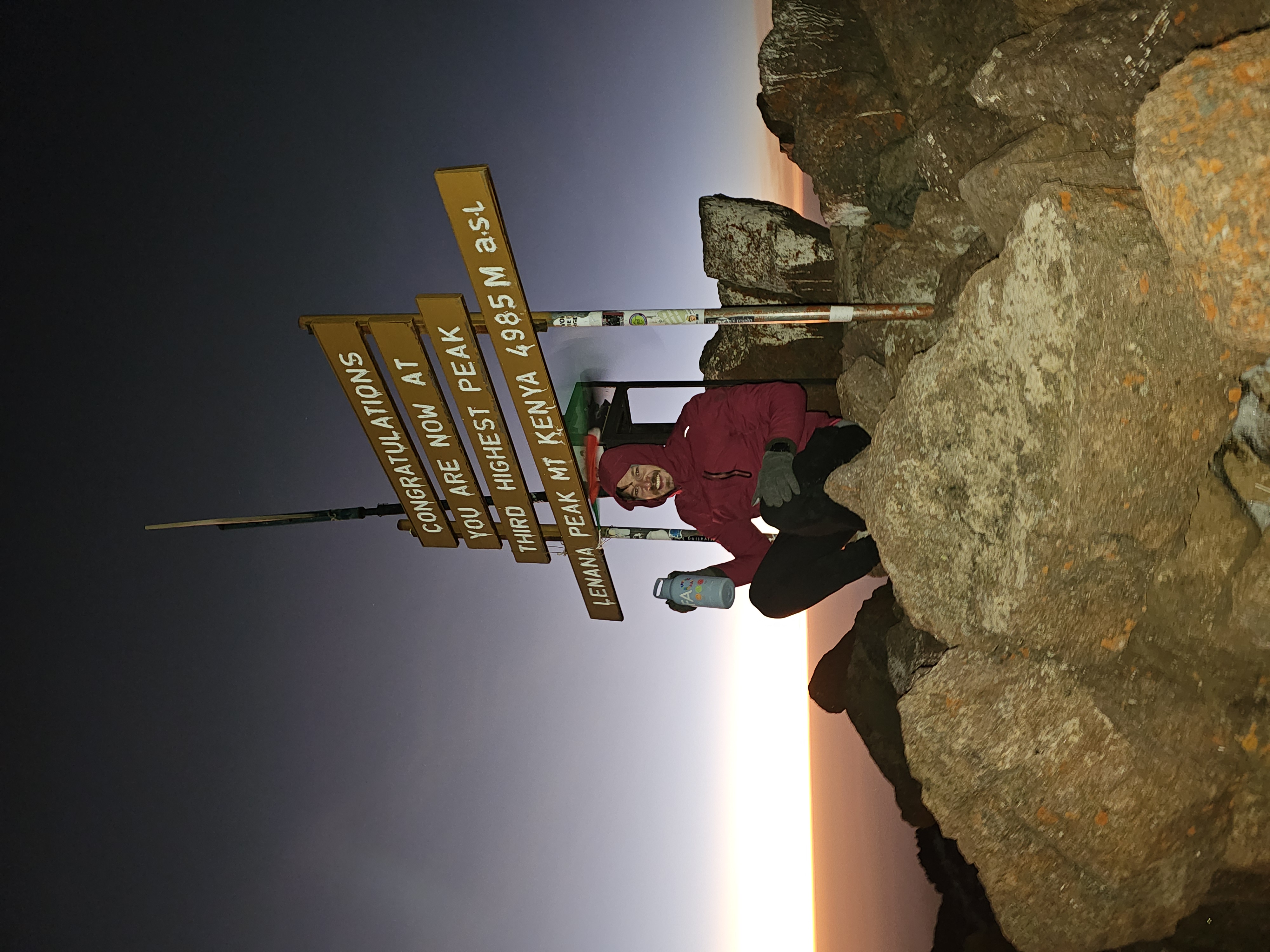 Todd at the summit of Mt Kenya Lenana Peak at sunrise